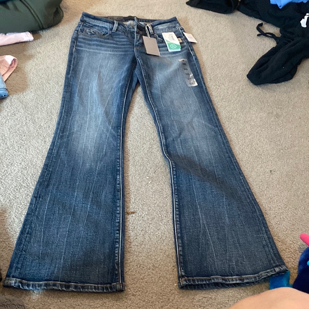 Buckle black boot cut jeans